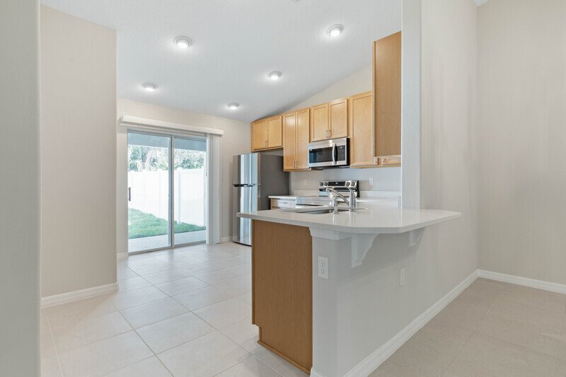 FULLY FENCED, BRAND NEW 3/2/1 TOWNHOUSE IN BEAUTIFUL SEMINOLE WOODS property image