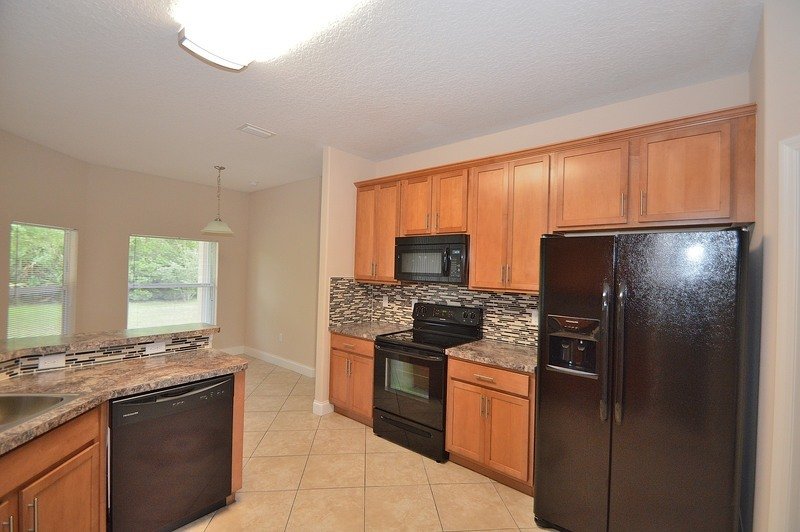 SPACIOUS 4/2/2 IN DESIRABLE MATANZAS WOODS property image