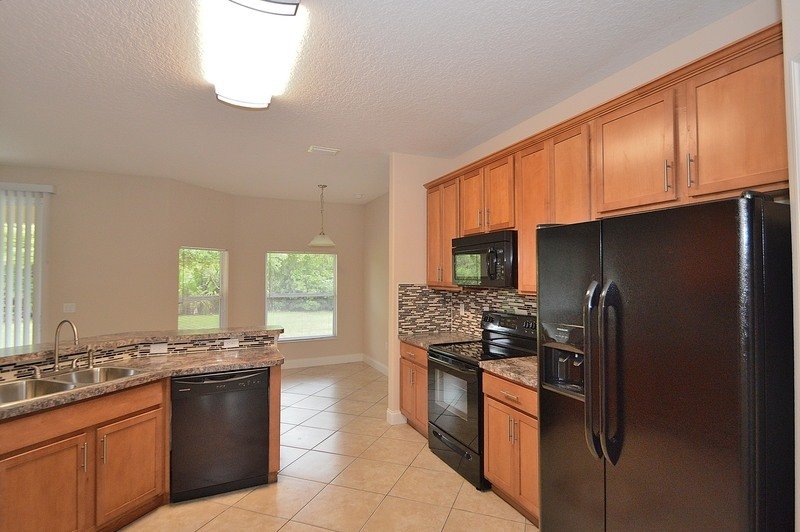 SPACIOUS 4/2/2 IN DESIRABLE MATANZAS WOODS property image