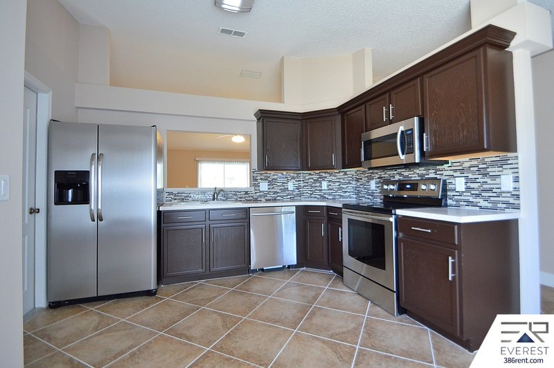 FULLY FENCED 3/2/2 POOL HOME IN POPULAR LEHIGH WOODS property image