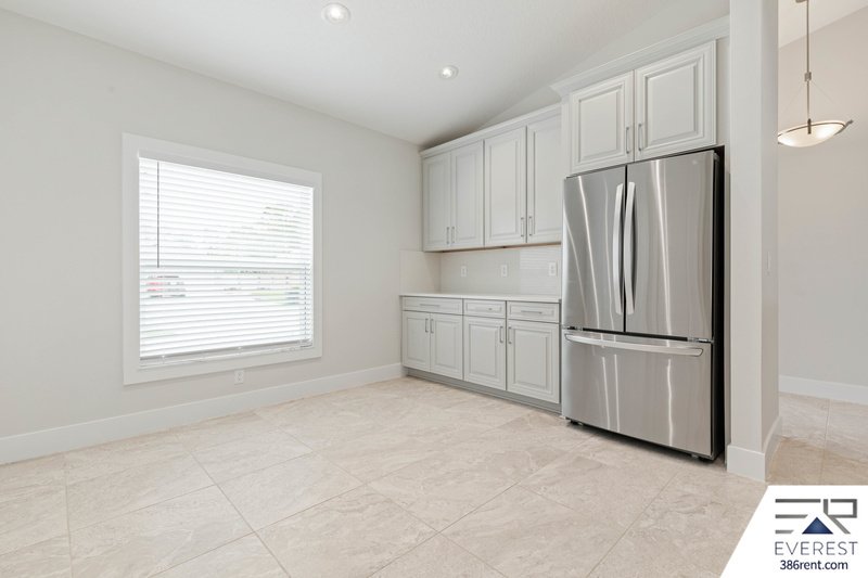 LIKE NEW, CUSTOM BUILT 4/3/2 IN BEAUTIFUL PINE LAKES property image