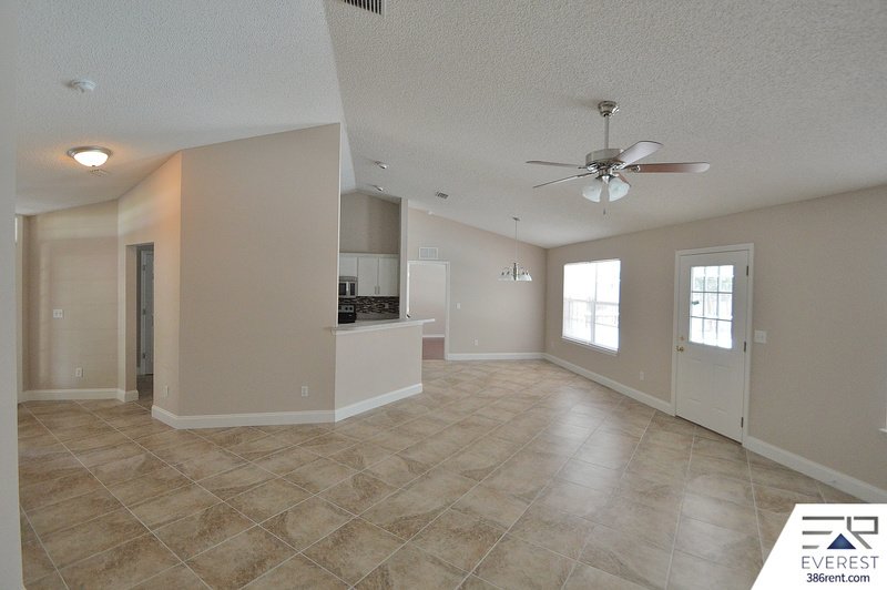 FULLY FENCED 4/2/2 POOL HOME IN THE HEART OF PALM COAST property image