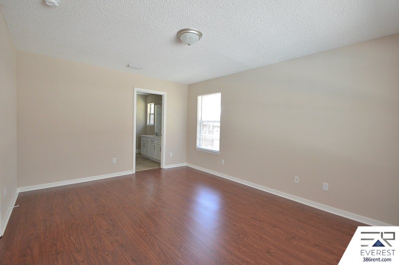 FULLY FENCED 4/2/2 POOL HOME IN THE HEART OF PALM COAST property image