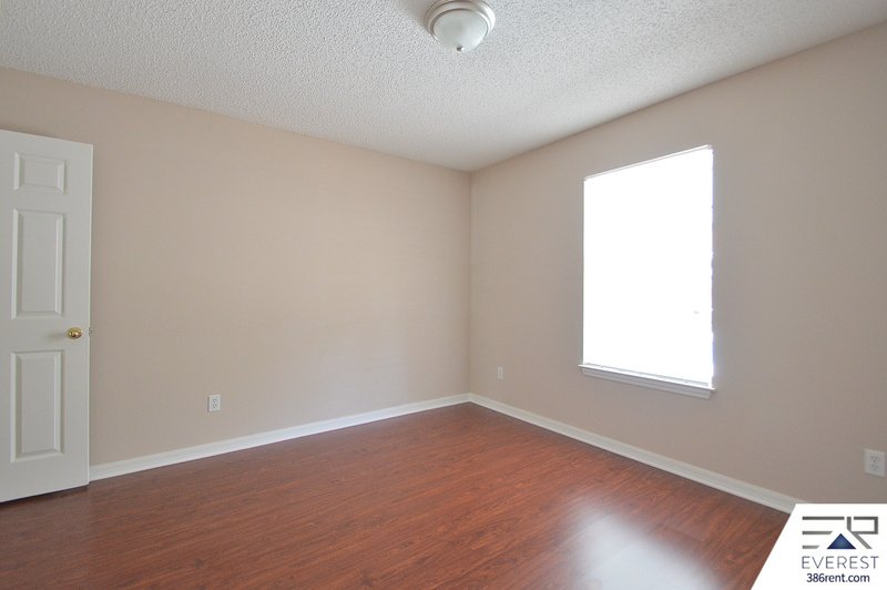 FULLY FENCED 4/2/2 POOL HOME IN THE HEART OF PALM COAST property image