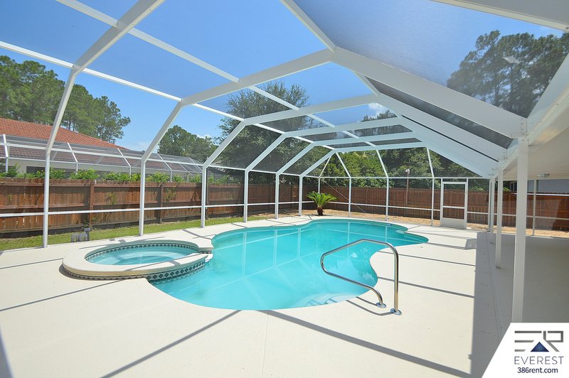 FULLY FENCED 4/2/2 POOL HOME IN THE HEART OF PALM COAST property image