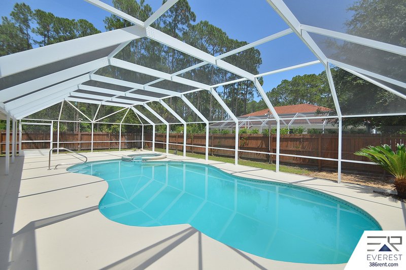 FULLY FENCED 4/2/2 POOL HOME IN THE HEART OF PALM COAST property image