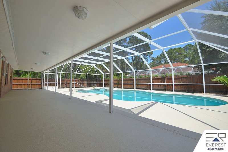 FULLY FENCED 4/2/2 POOL HOME IN THE HEART OF PALM COAST property image