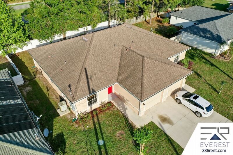 FULLY FENCED 3/2/2 TOWN HOME IN THE HEART OF PALM COAST property image