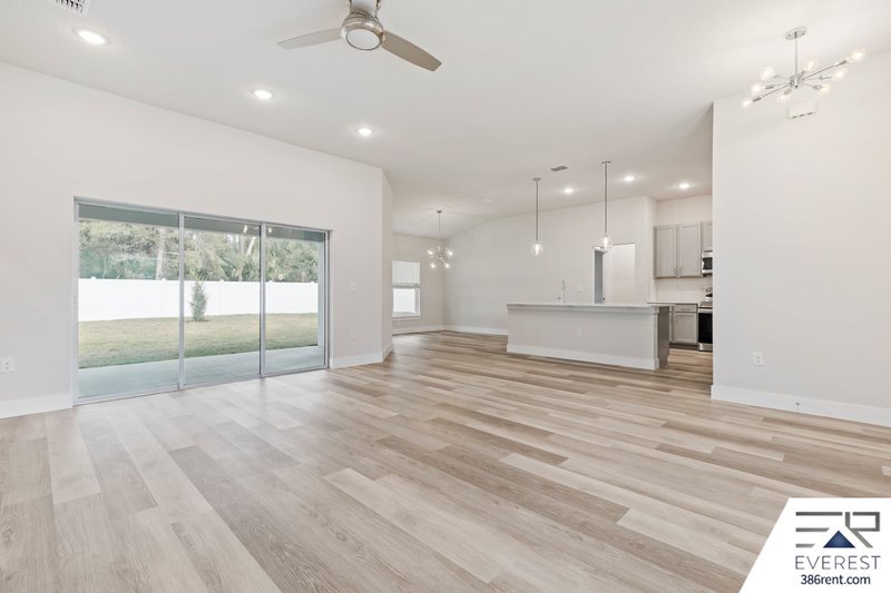 FULLY FENCED, UPGRADED 3/2/2 IN DESIRABLE PINE GROVE property image