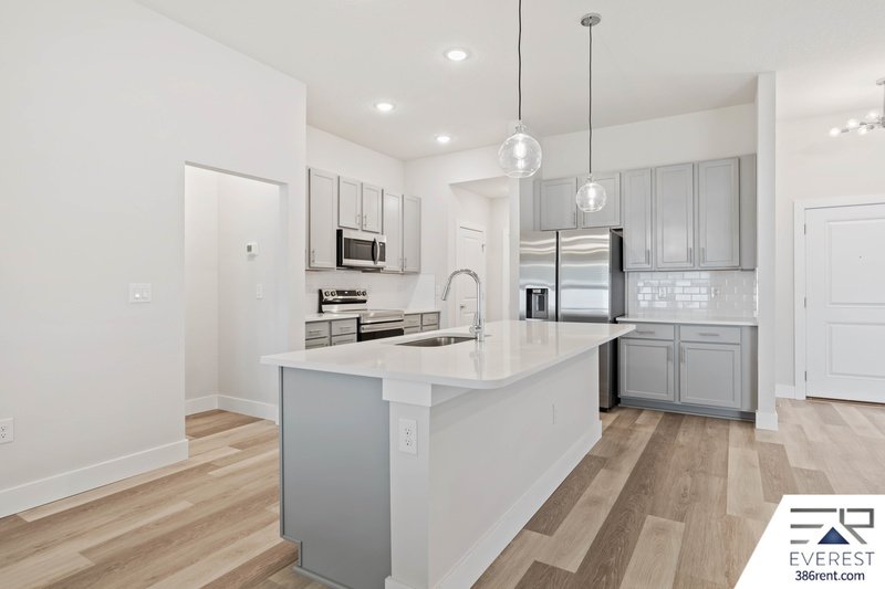 FULLY FENCED, UPGRADED 3/2/2 IN DESIRABLE PINE GROVE property image