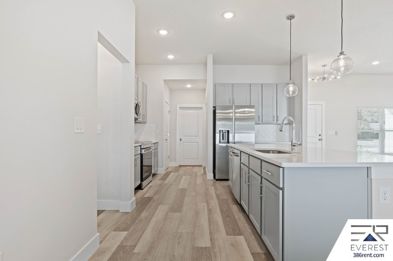 FULLY FENCED, UPGRADED 3/2/2 IN DESIRABLE PINE GROVE property image