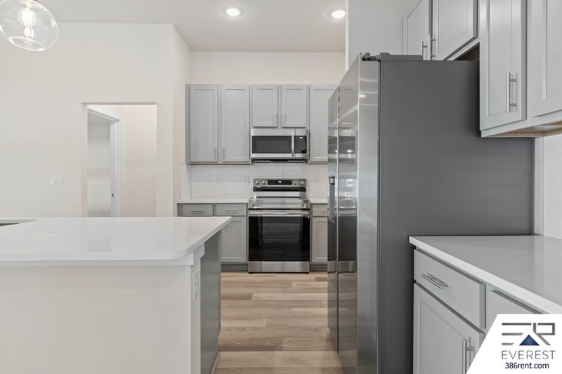 FULLY FENCED, UPGRADED 3/2/2 IN DESIRABLE PINE GROVE property image