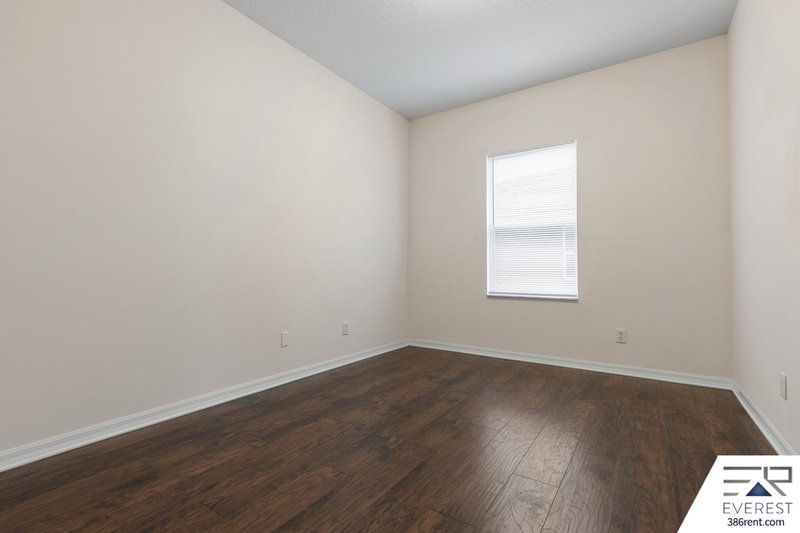 FULLY FENCED, SPACIOUS 4/2.5/2 ON A CUL-DE-SAC IN LEHIGH WOODS property image