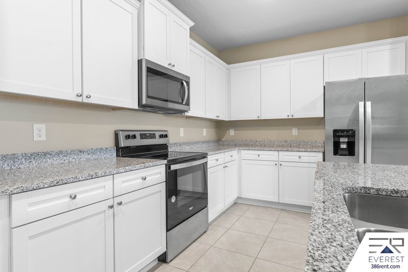 LIKE NEW 3/2.5/1 TOWNHOUSE IN DESIRABLE PALM COAST property image