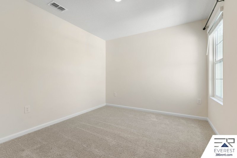 LIKE NEW 3/2.5/1 TOWNHOUSE IN DESIRABLE PALM COAST property image