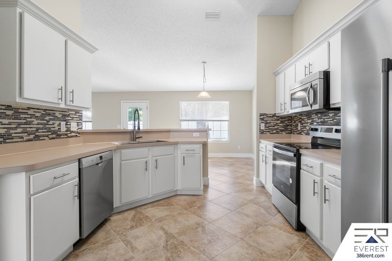 FULLY FENCED 4/2/2 IN DESIRABLE PINE GROVE property image