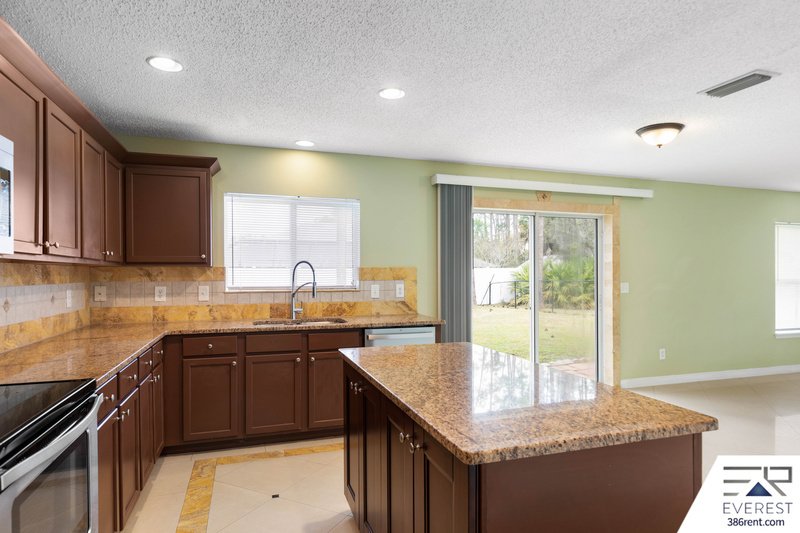 FULLY FENCED, SPACIOUS 4/2.5/2 IN THE HEART OF PALM COAST property image