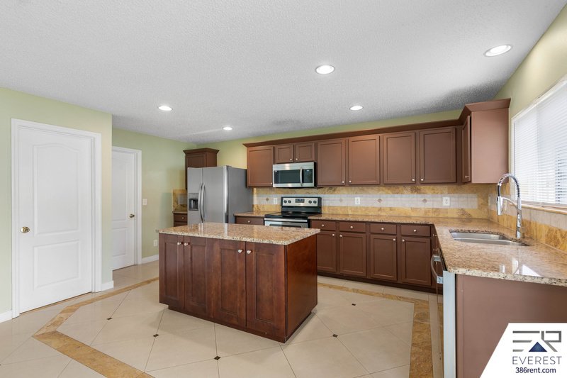 FULLY FENCED, SPACIOUS 4/2.5/2 IN THE HEART OF PALM COAST property image