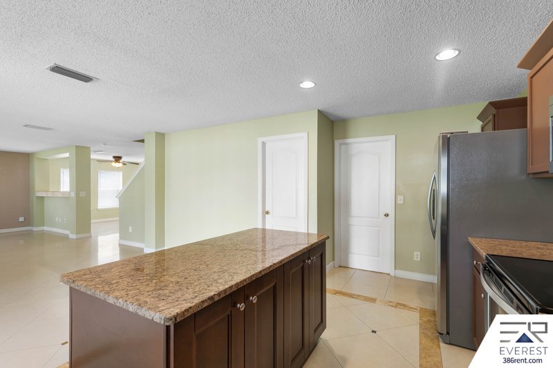 FULLY FENCED, SPACIOUS 4/2.5/2 IN THE HEART OF PALM COAST property image