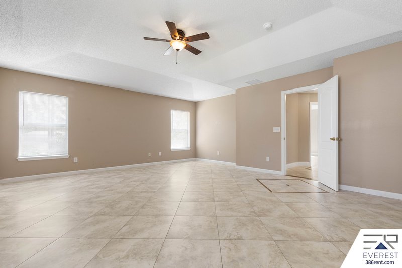 FULLY FENCED, SPACIOUS 4/2.5/2 IN THE HEART OF PALM COAST property image