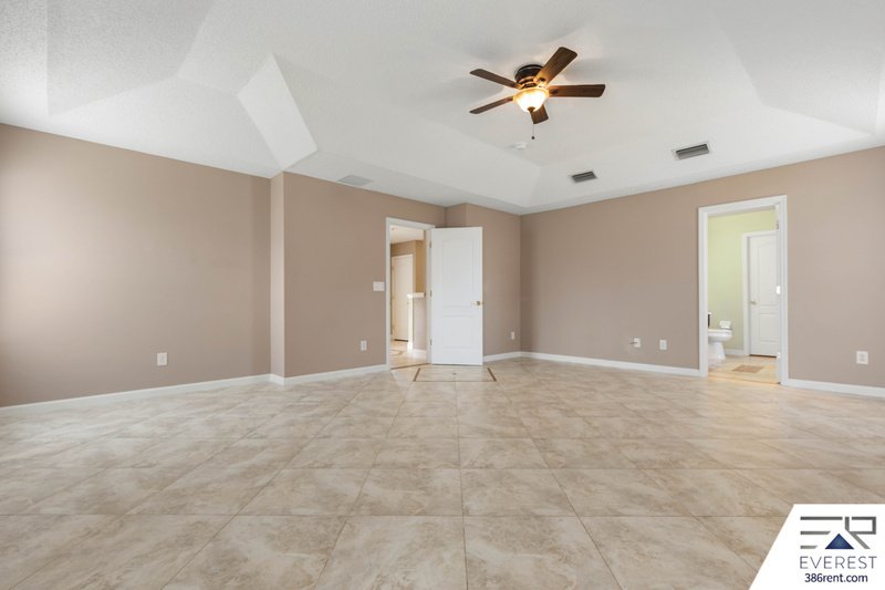 FULLY FENCED, SPACIOUS 4/2.5/2 IN THE HEART OF PALM COAST property image