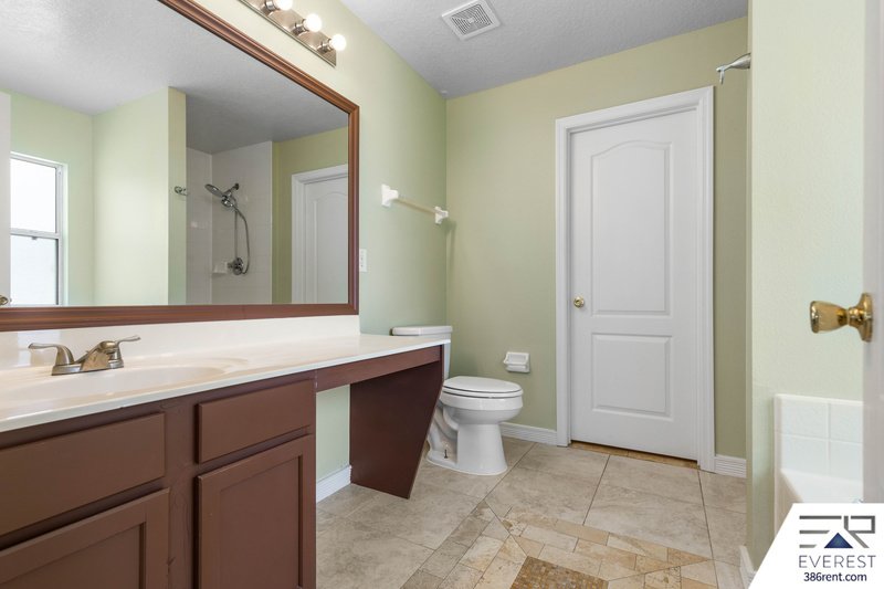 FULLY FENCED, SPACIOUS 4/2.5/2 IN THE HEART OF PALM COAST property image