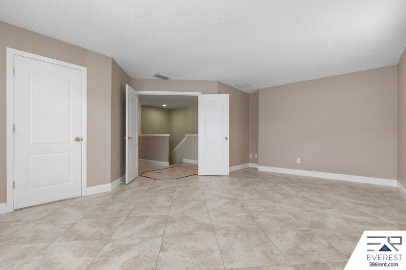 FULLY FENCED, SPACIOUS 4/2.5/2 IN THE HEART OF PALM COAST property image