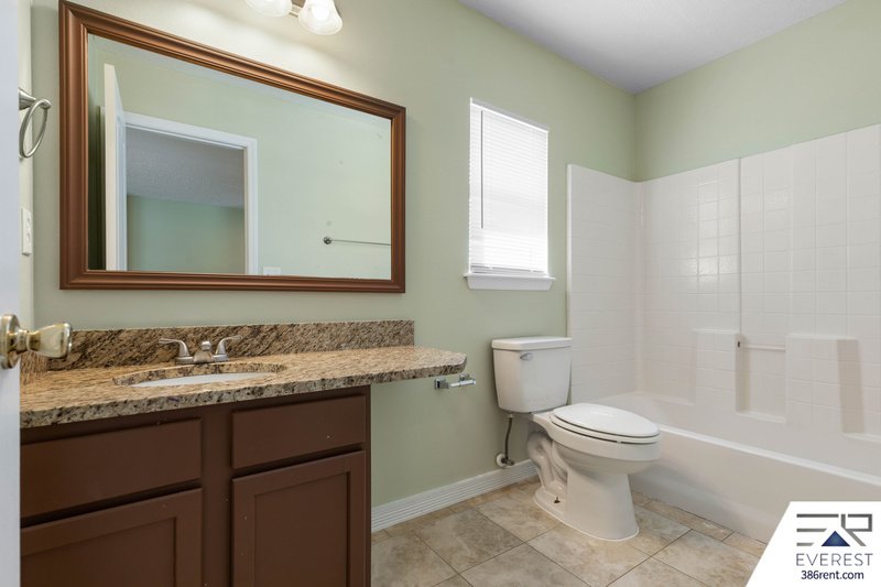 FULLY FENCED, SPACIOUS 4/2.5/2 IN THE HEART OF PALM COAST property image