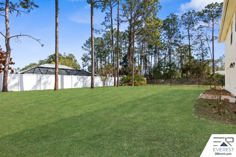 FULLY FENCED, SPACIOUS 4/2.5/2 IN THE HEART OF PALM COAST property image