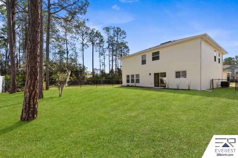 FULLY FENCED, SPACIOUS 4/2.5/2 IN THE HEART OF PALM COAST property image