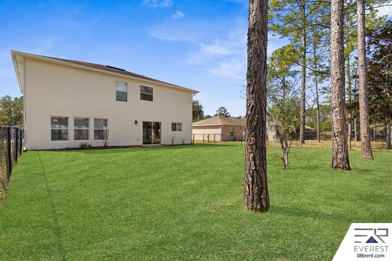 FULLY FENCED, SPACIOUS 4/2.5/2 IN THE HEART OF PALM COAST property image