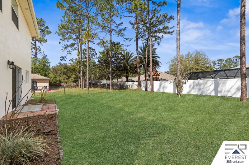 FULLY FENCED, SPACIOUS 4/2.5/2 IN THE HEART OF PALM COAST property image