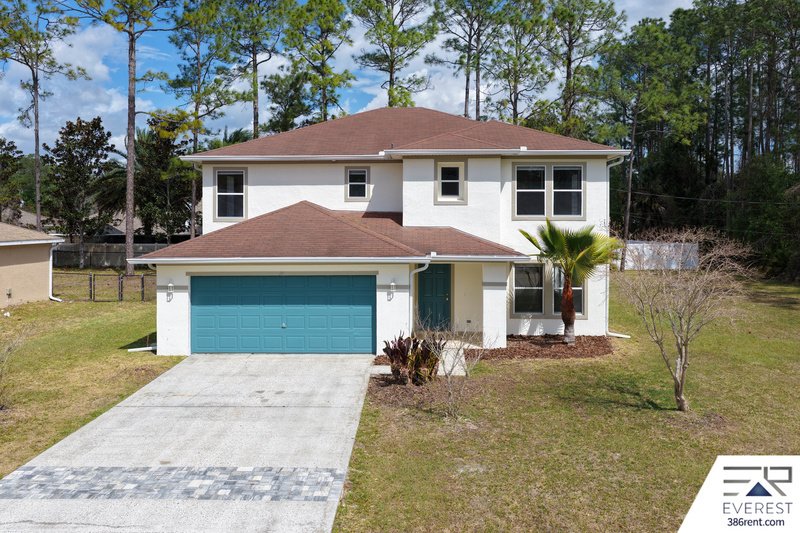 FULLY FENCED, SPACIOUS 4/2.5/2 IN THE HEART OF PALM COAST property image