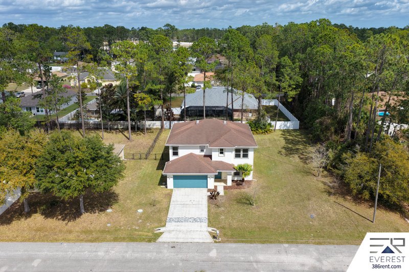 FULLY FENCED, SPACIOUS 4/2.5/2 IN THE HEART OF PALM COAST property image