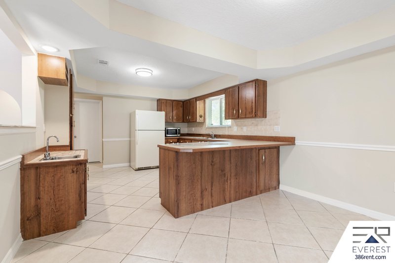 FULLY FENCED 2/2/2 IN DESIRABLE PALM HARBOR property image