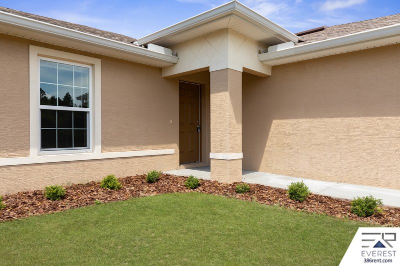 FULLY FENCED, LIKE NEW 3/2/1 IN DESIRABLE MATANZAS WOODS property image