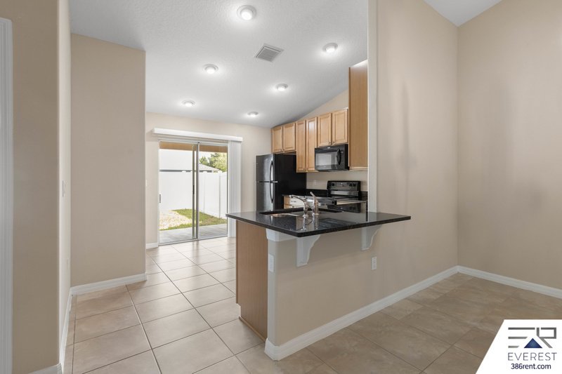 FULLY FENCED, LIKE NEW 3/2/1 IN DESIRABLE MATANZAS WOODS property image