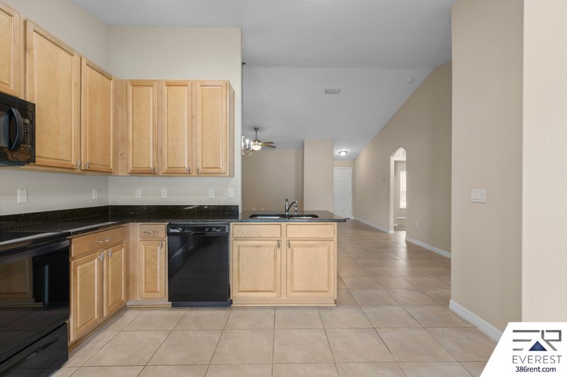 FULLY FENCED, LIKE NEW 3/2/1 IN DESIRABLE MATANZAS WOODS property image