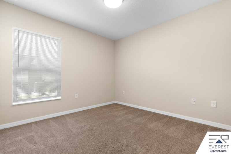 FULLY FENCED, LIKE NEW 3/2/1 IN DESIRABLE MATANZAS WOODS property image