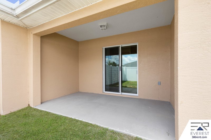 FULLY FENCED, LIKE NEW 3/2/1 IN DESIRABLE MATANZAS WOODS property image