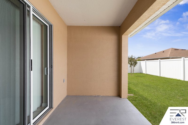 FULLY FENCED, LIKE NEW 3/2/1 IN DESIRABLE MATANZAS WOODS property image