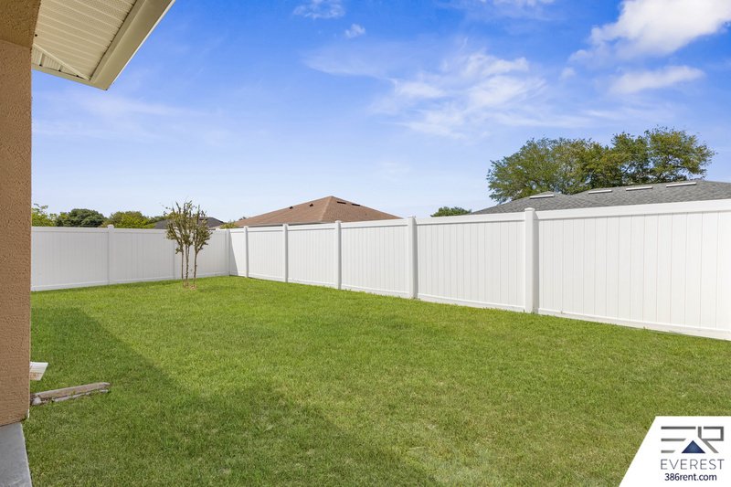 FULLY FENCED, LIKE NEW 3/2/1 IN DESIRABLE MATANZAS WOODS property image