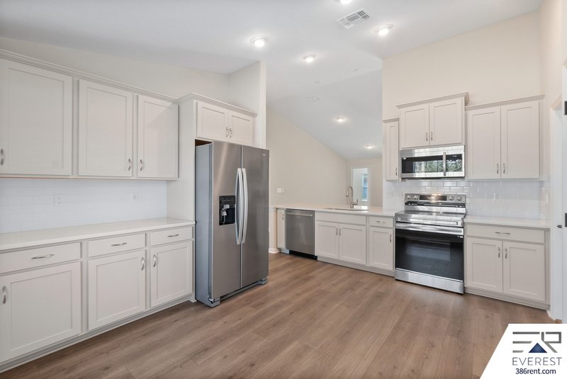 FULLY FENCED, LIKE NEW 4/2/2 IN POPULAR PINE GROVE property image