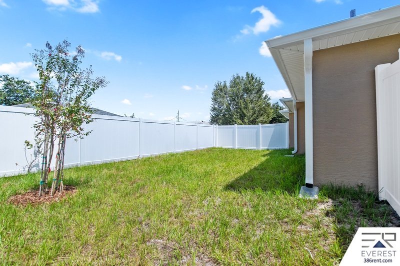 FULLY FENCED 3/2/1 IN DESIRABLE MATANZAS WOODS property image