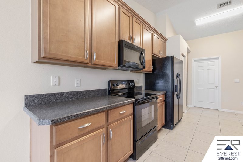 LIKE NEW 4/3/2 IN POPULAR LEHIGH WOODS property image