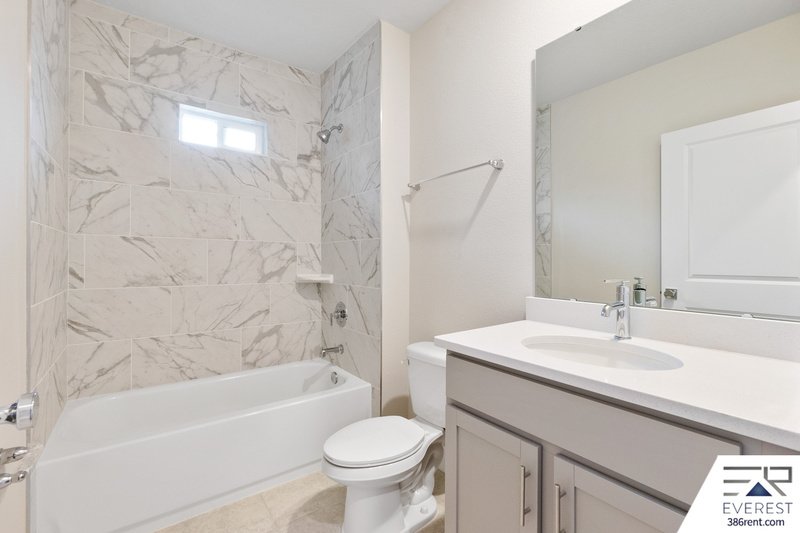 LIKE NEW, UPGRADED 3/2/2 IN POPULAR LEHIGH WOODS property image