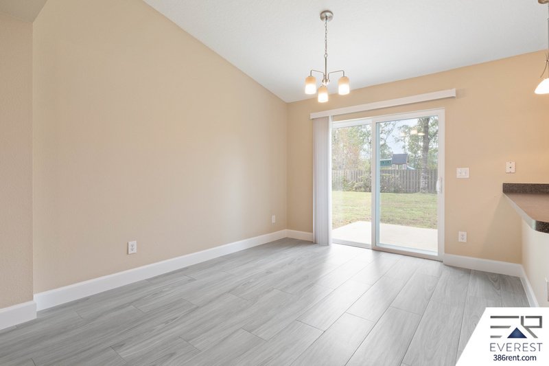 FULLY FENCED, LIKE NEW 3/2/1 IN POPULAR LEHIGH WOODS property image