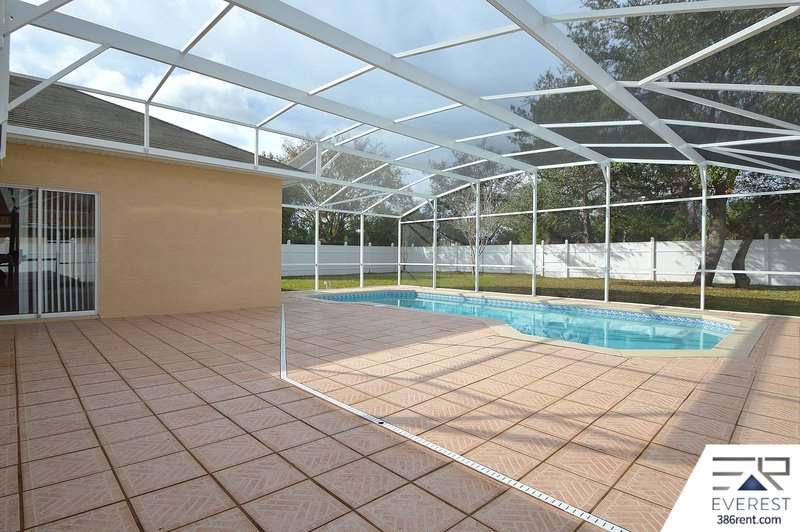 FULLY FENCED 3/2/2 POOL HOME IN DESIRABLE PALM HARBOR property image