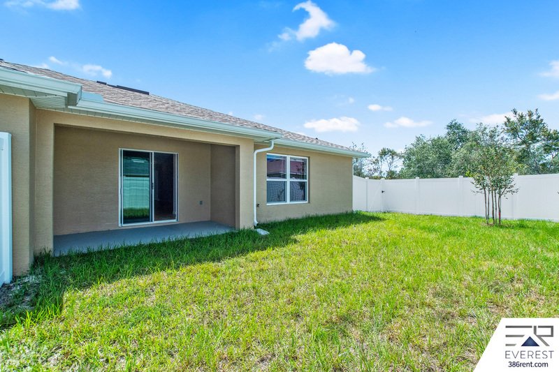 FULLY FENCED 3/2/1 IN DESIRABLE MATANZAS WOODS property image